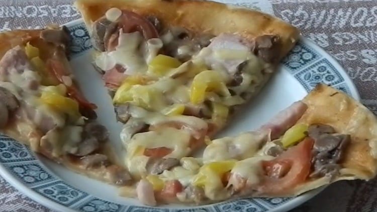 La pizza ai funghi è pronta!