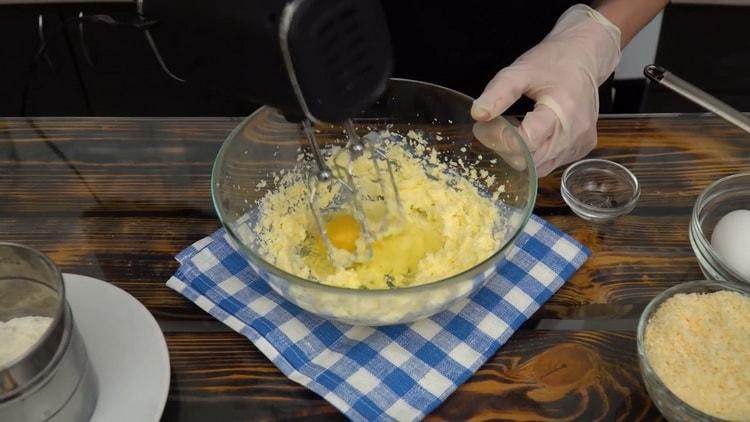 Per preparare i biscotti al cocco, batti gli ingredienti