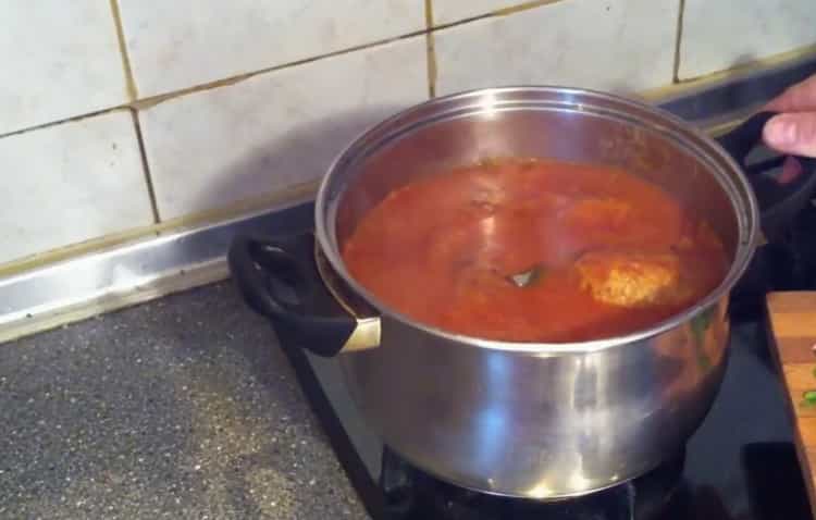 Il cavolo pigro arriva a fiumi una casseruola secondo una ricetta graduale con la foto