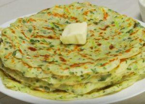 Prepariamo frittelle profumate di zucchine secondo una ricetta passo-passo con una foto.