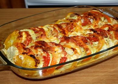 Contorno di zucchine con pomodori e formaggio al forno